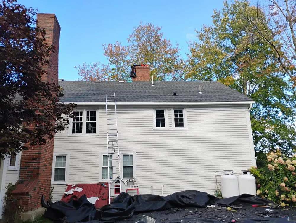 Slide of KCM Roofing