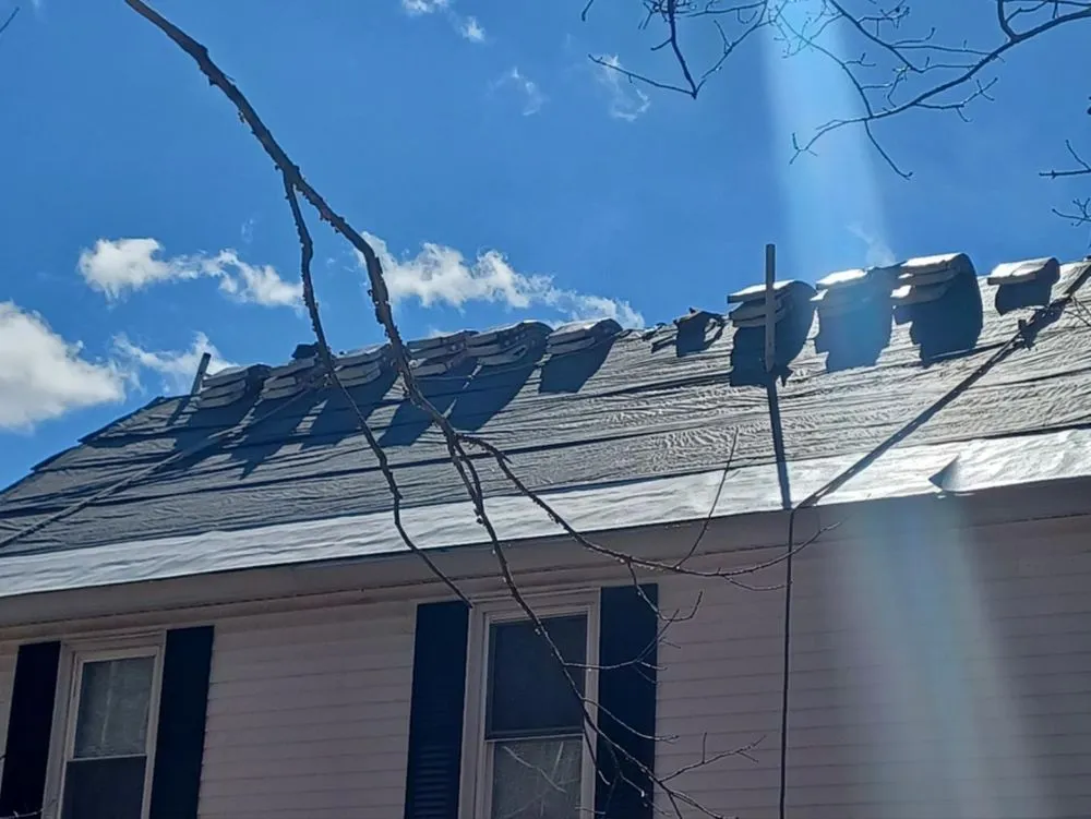 Slide of KCM Roofing