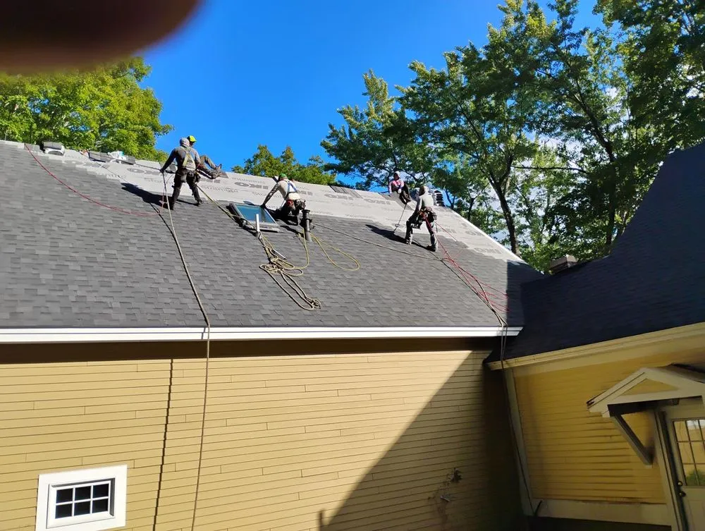 Slide of KCM Roofing