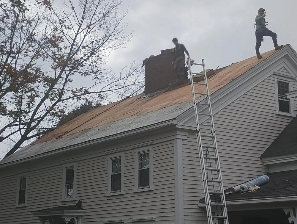 Slide of KCM Roofing