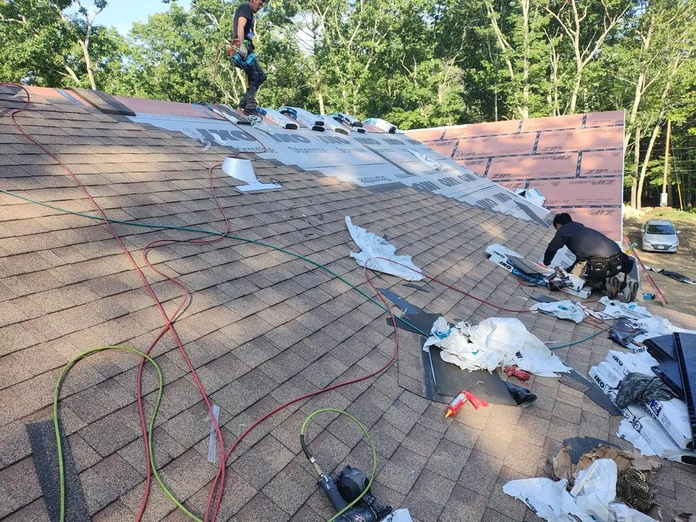 Slide of KCM Roofing