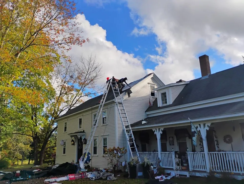 Slide of KCM Roofing