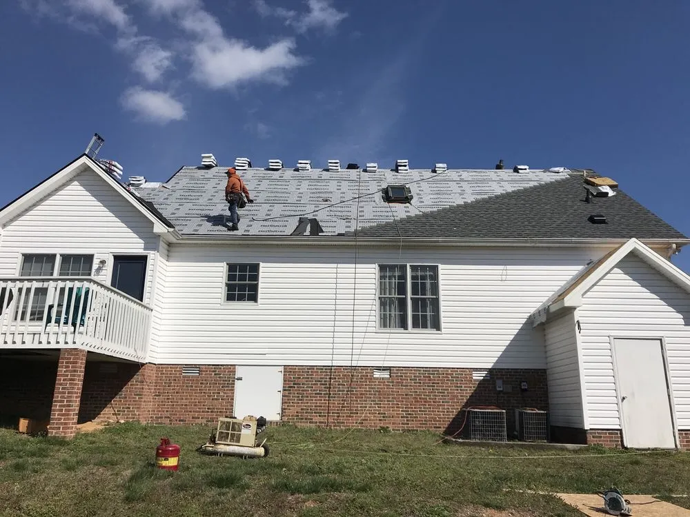 Slide of K&D Roofing