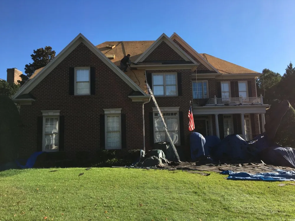 Slide of K&D Roofing