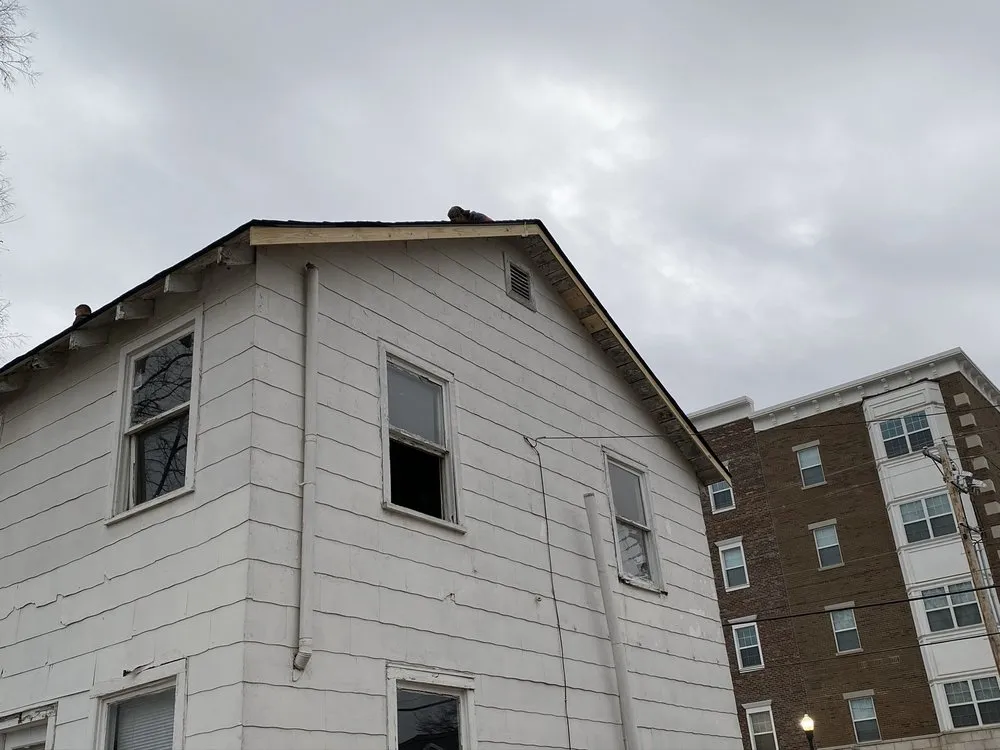 Slide of Keen Roofing