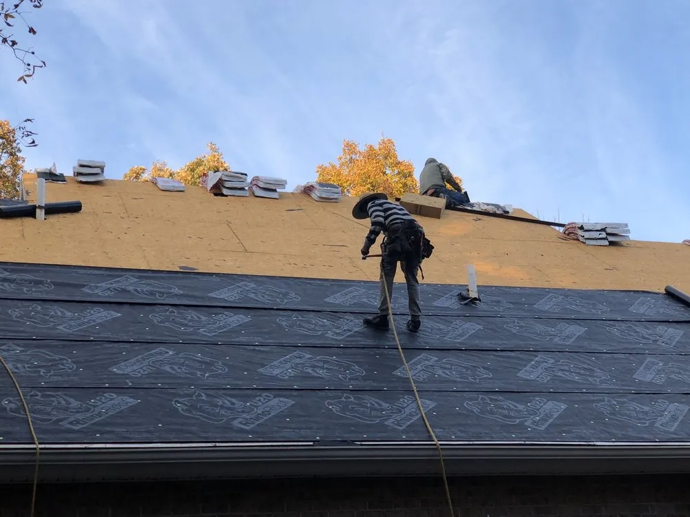 Slide of Keen Roofing