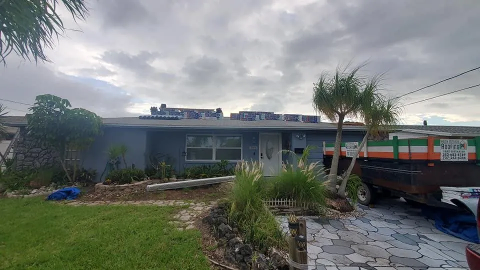 Slide of Keith Melady Roofing