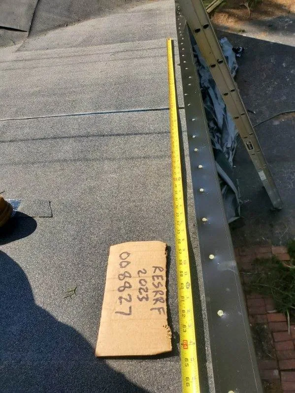 Slide of Keith Melady Roofing