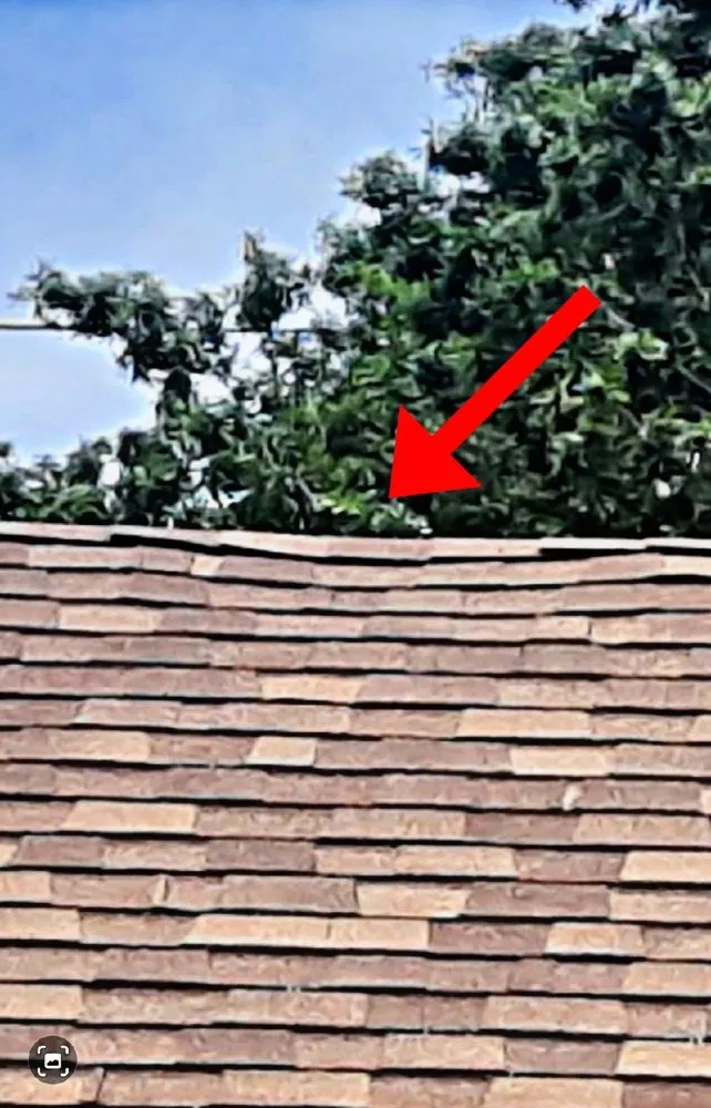 Slide of Keith's Roofing