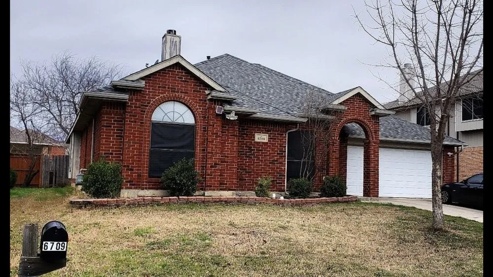 Slide of Kelley's Quality Roofing