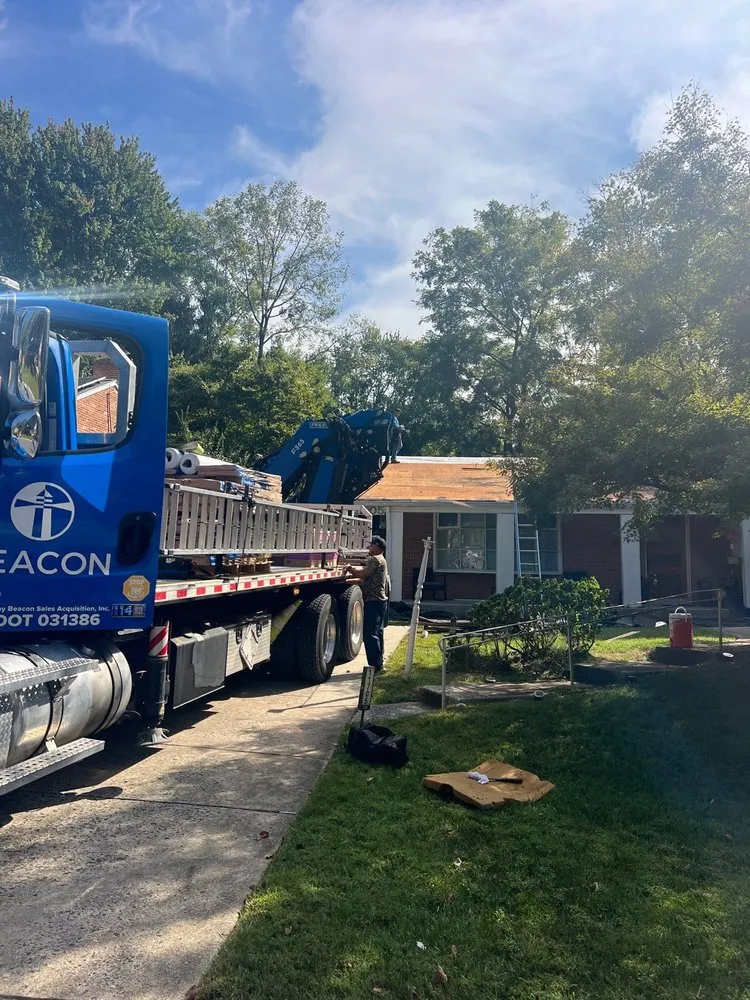 Slide of Kelly Roofing