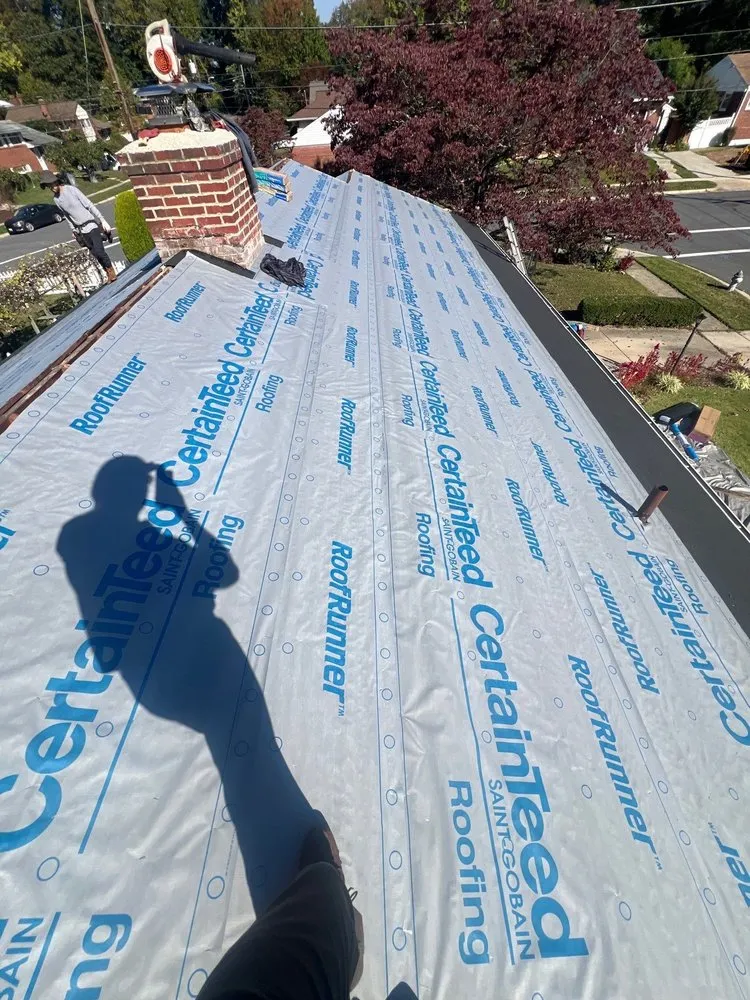 Slide of Kelly Roofing