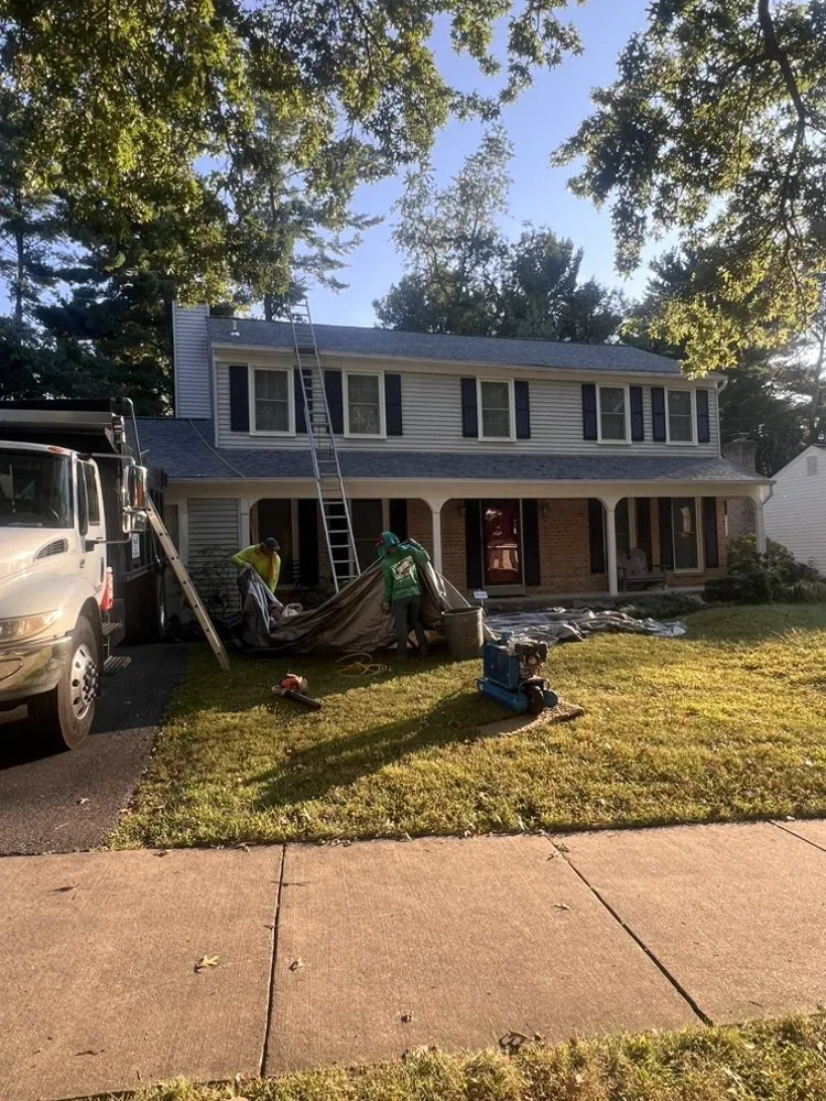 Slide of Kelly Roofing