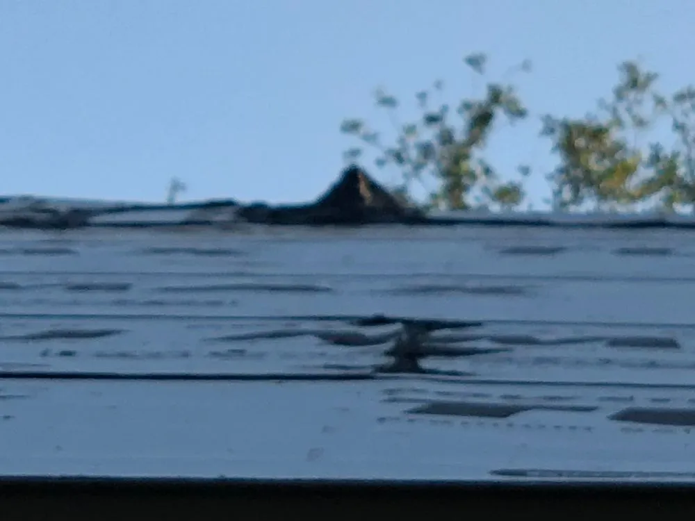 Slide of Kelly Roofing