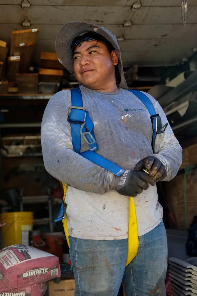 Slide of Kelly Roofing