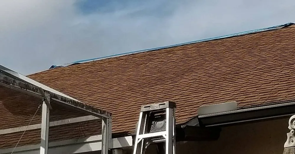 Slide of Kelly Roofing