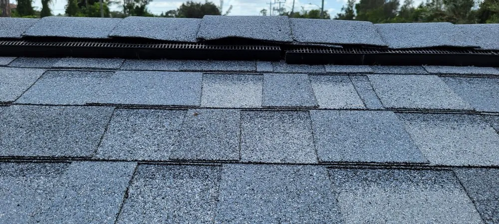 Slide of Kelly Roofing