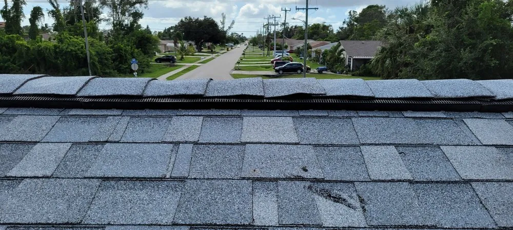 Slide of Kelly Roofing