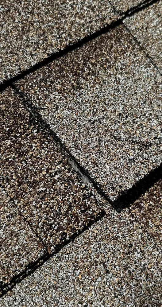 Slide of Kelly Roofing