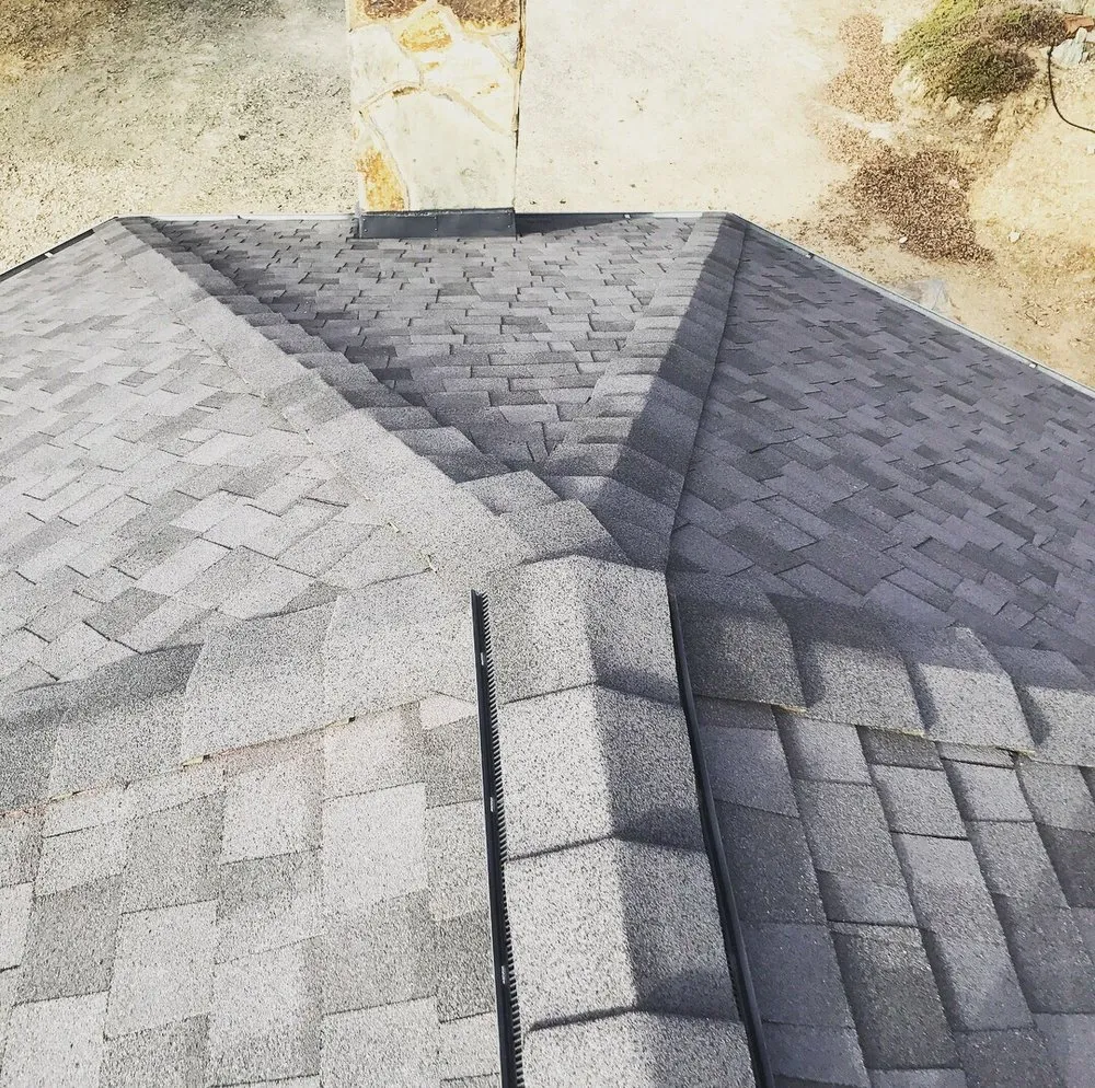 Slide of Kelly Roofing