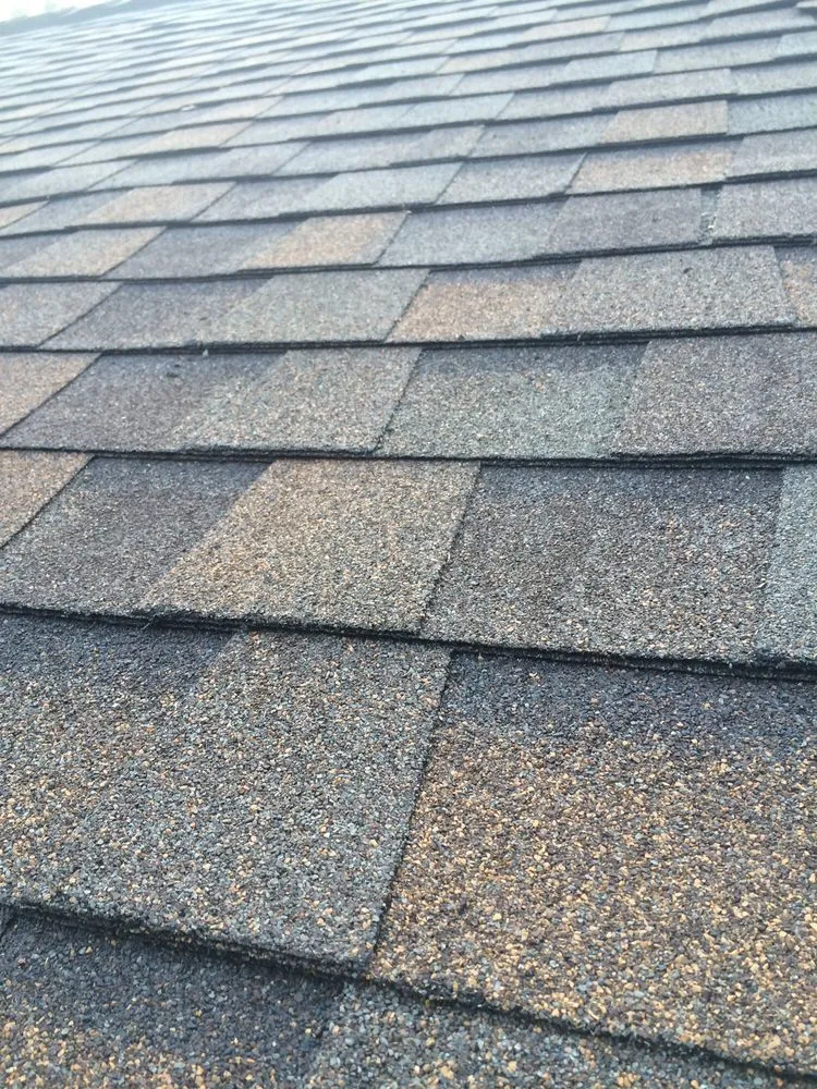 Slide of Kelly Roofing