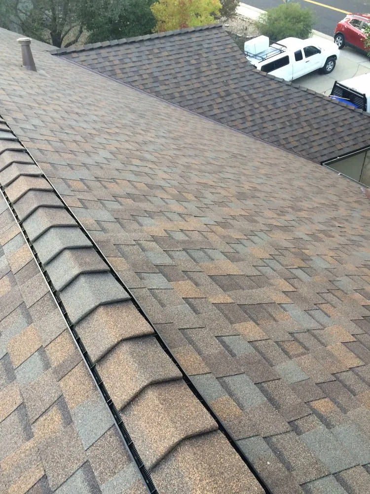 Slide of Kelly Roofing