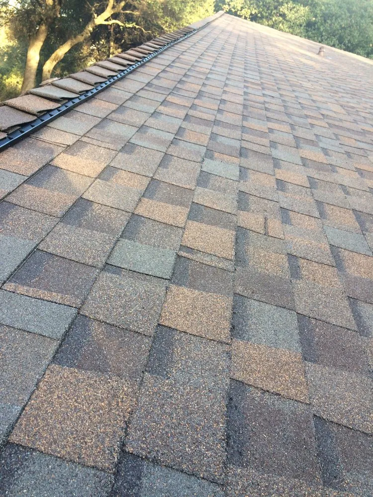 Slide of Kelly Roofing