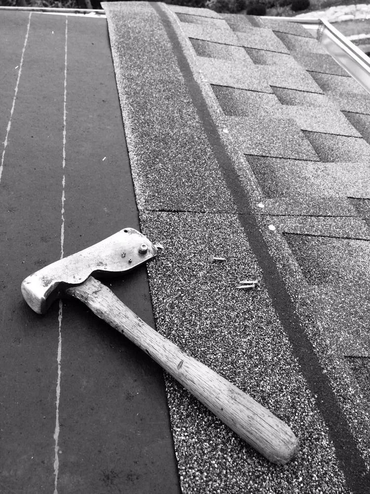 Slide of Kelly Roofing