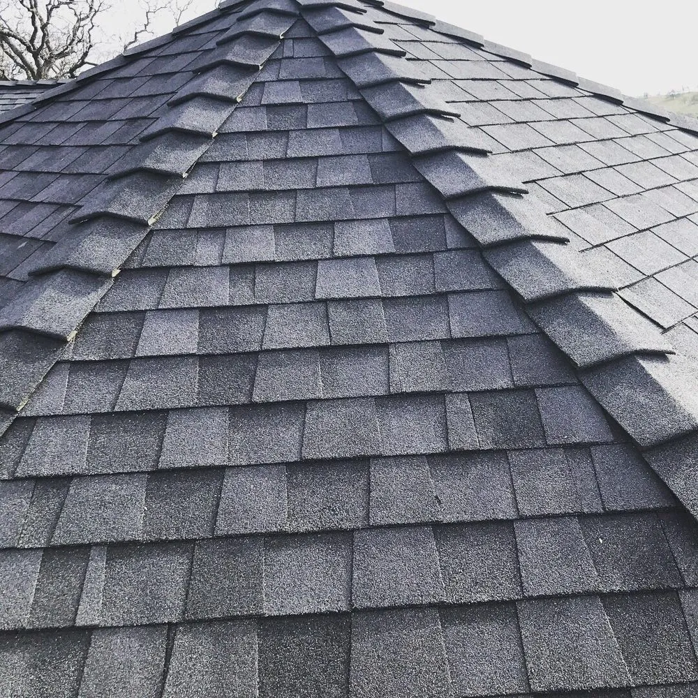 Slide of Kelly Roofing