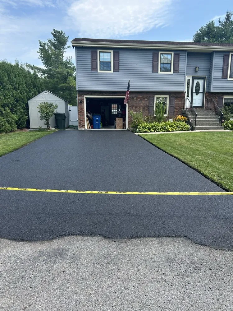 Slide of Kelly’s Roofing And Sealcoating