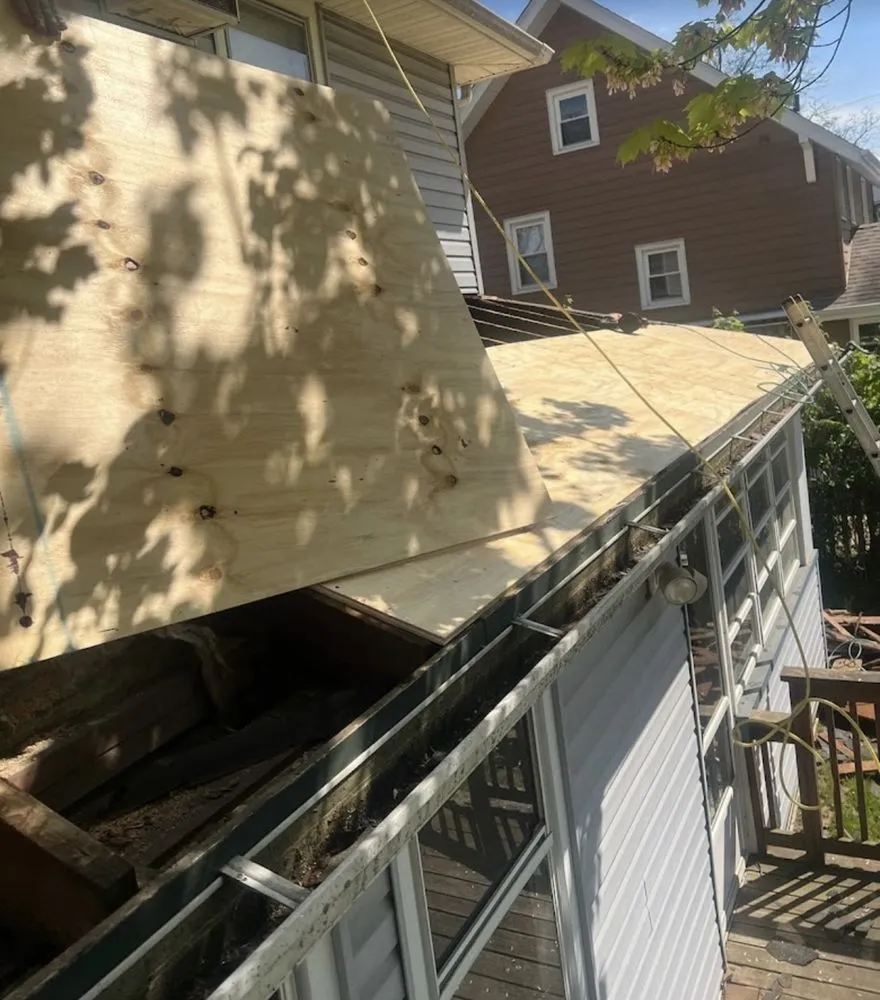 Slide of Kelly’s Roofing And Sealcoating