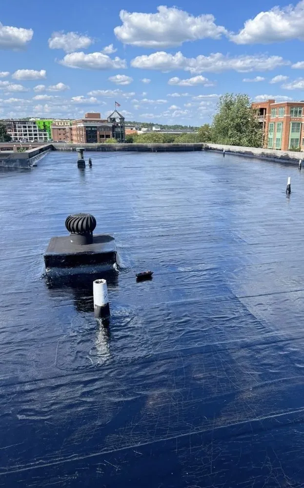 Slide of Kelly’s Roofing And Sealcoating