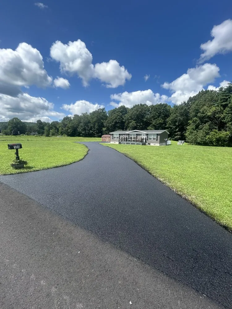 Slide of Kelly’s Roofing And Sealcoating