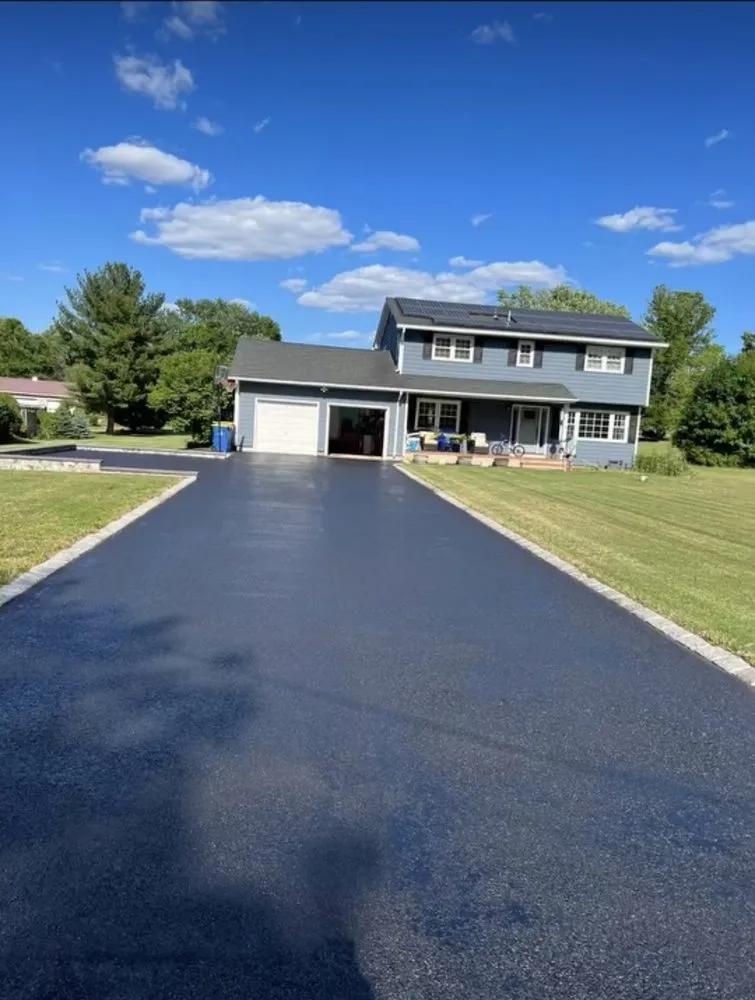 Slide of Kelly’s Roofing And Sealcoating