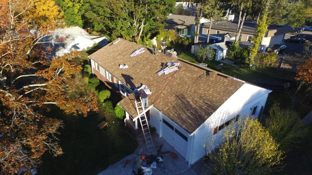 Slide of Kelly's Roofing