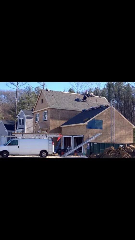 Slide of Kelly's Roofing