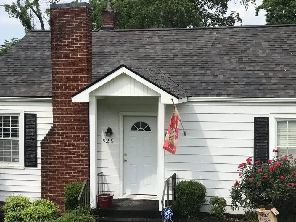 Slide of Kelt Roofing Company