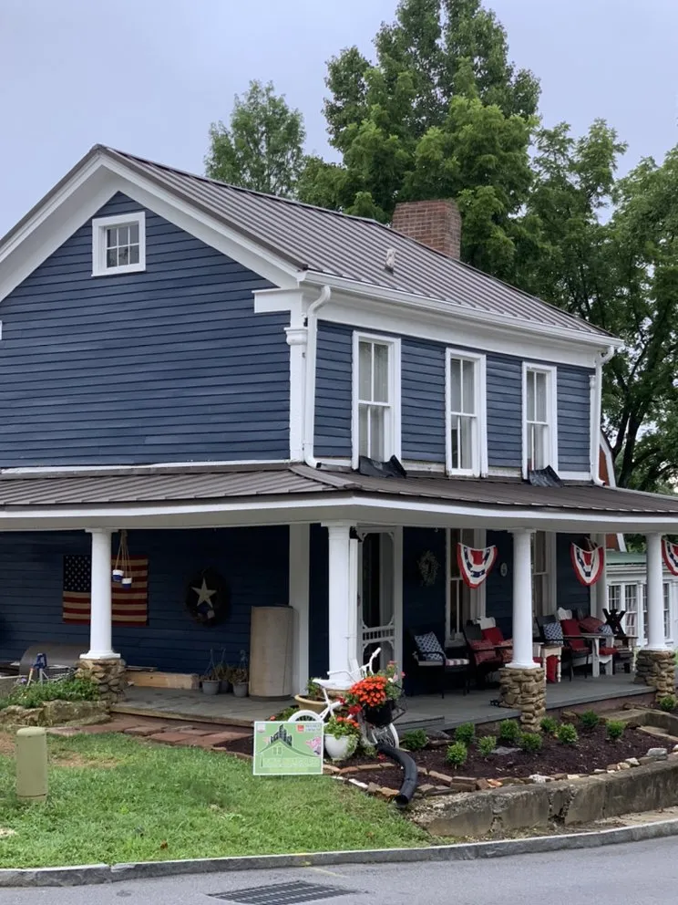 Slide of Kelt Roofing Company