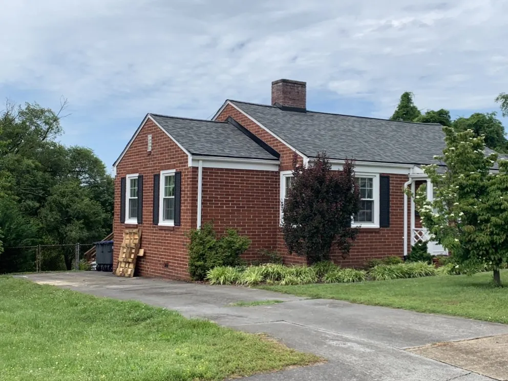 Slide of Kelt Roofing Company