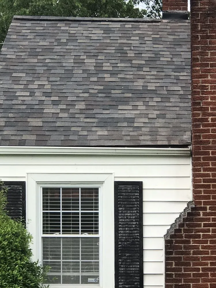 Slide of Kelt Roofing Company