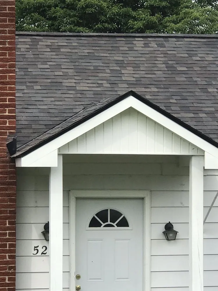 Slide of Kelt Roofing Company