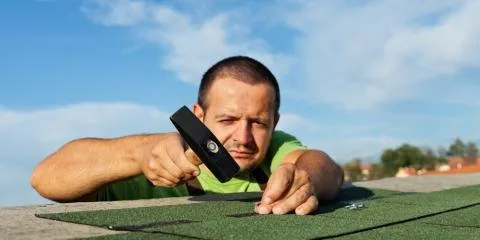 Slide of Ken Hauwiller Roofing