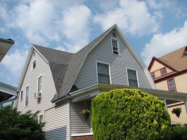 Slide of Ken Manschesky Roofing
