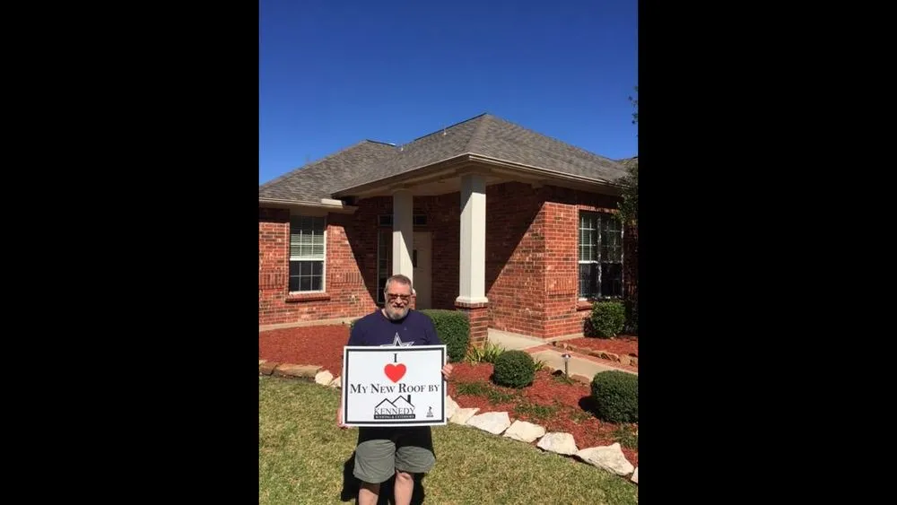 Slide of Kennedy Roofing & Exteriors