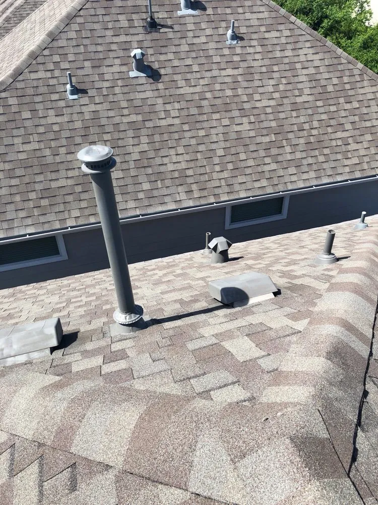 Slide of Kennedy Roofing & Exteriors