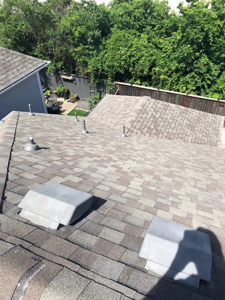 Slide of Kennedy Roofing & Exteriors