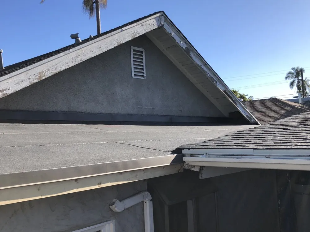 Slide of Kennedy Roofing