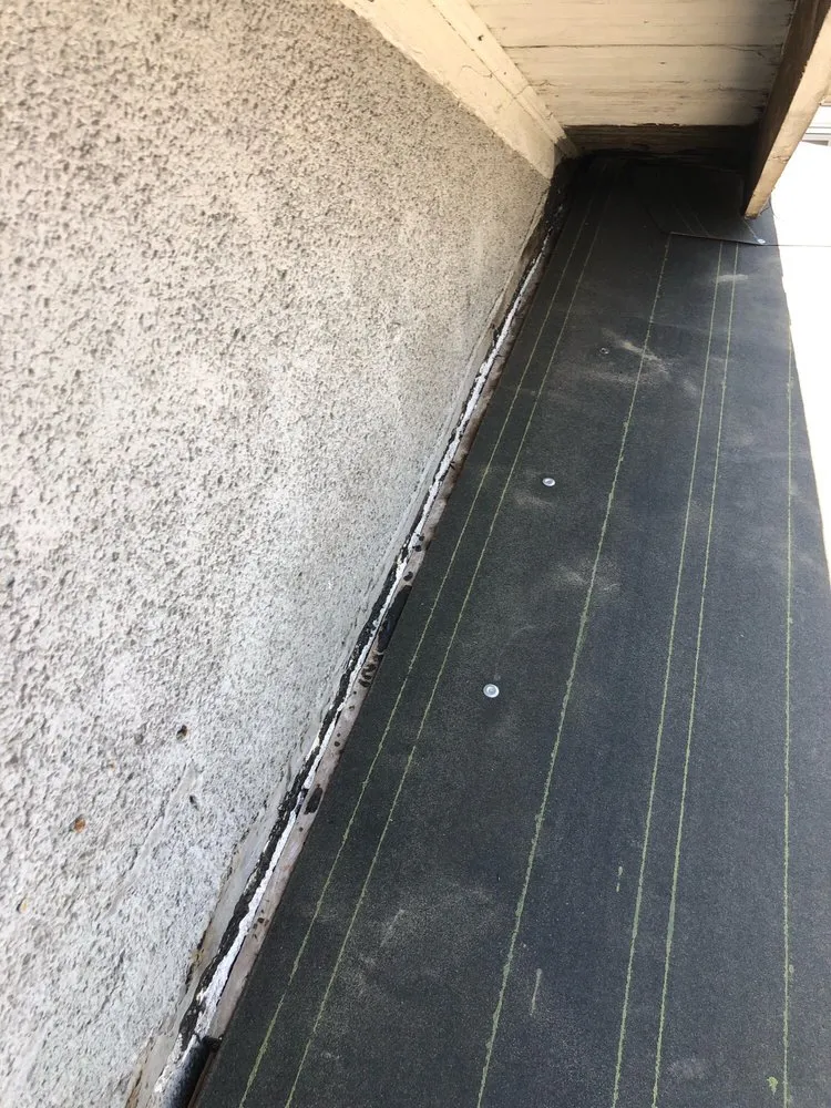 Slide of Kennedy Roofing