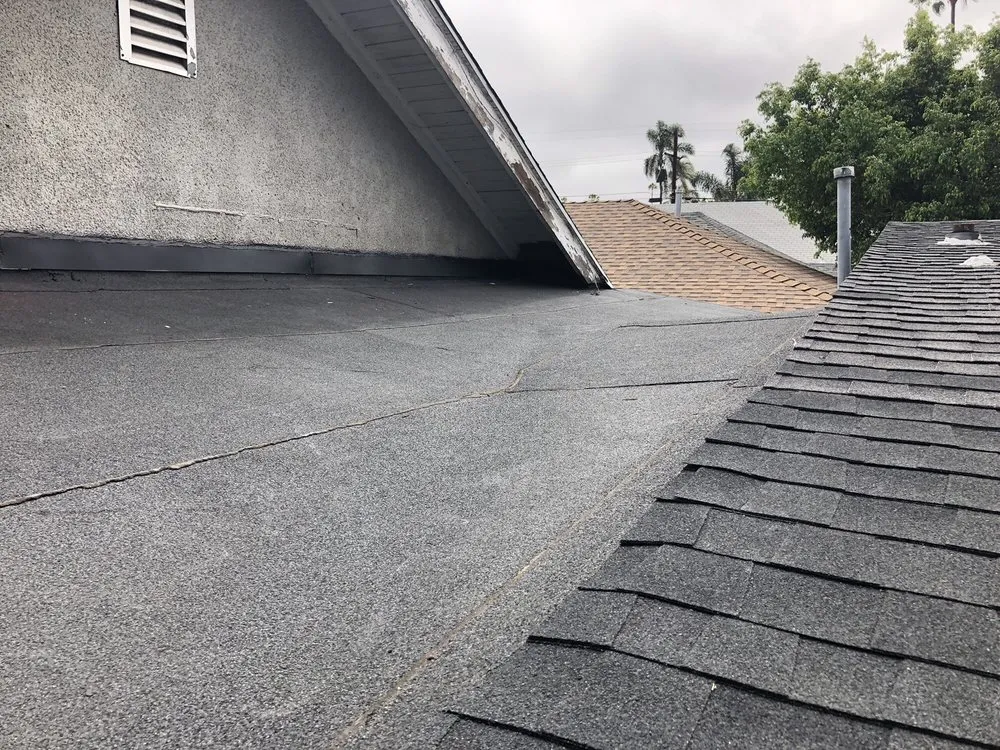 Slide of Kennedy Roofing