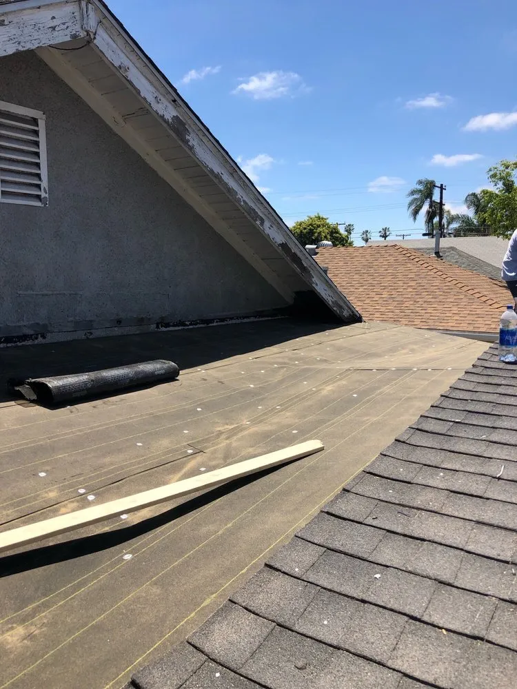 Slide of Kennedy Roofing